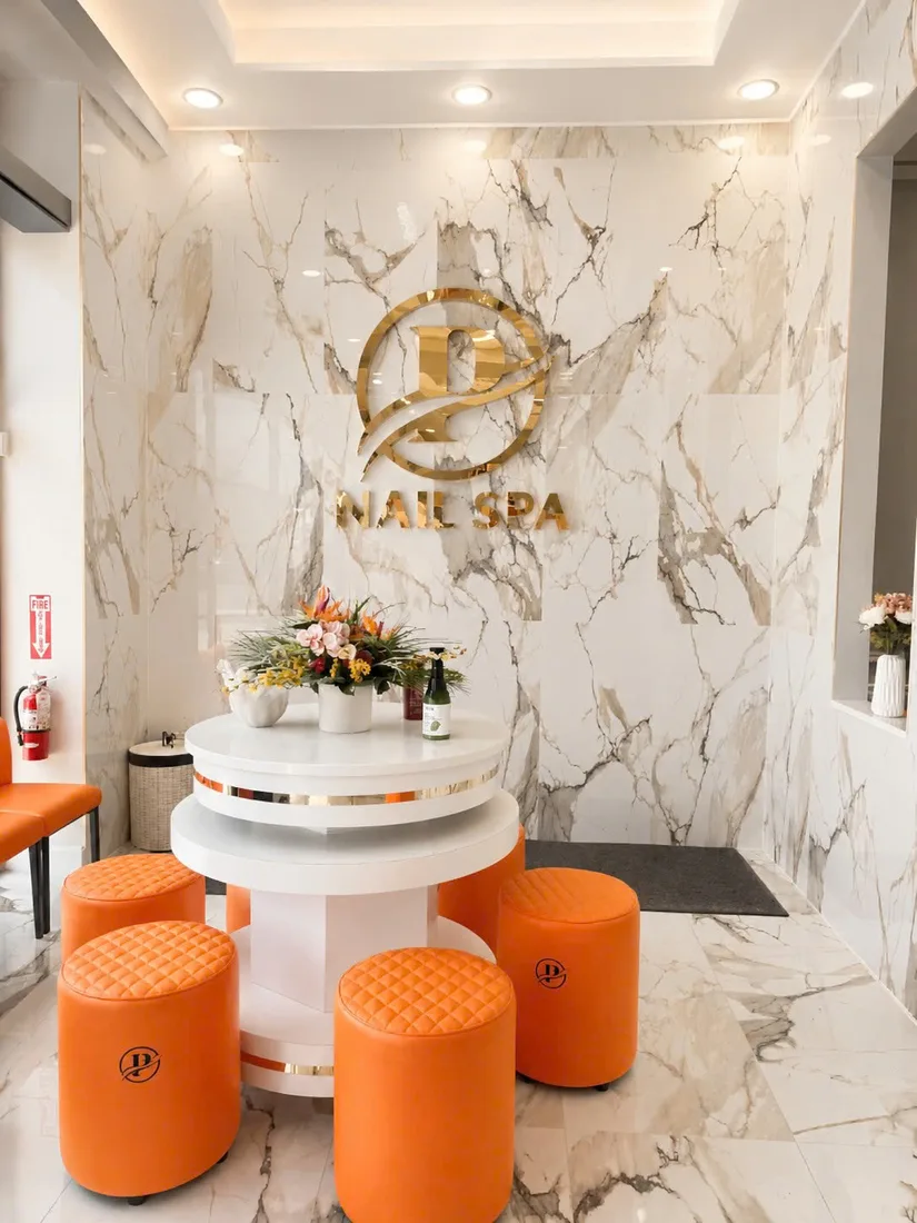 Gold P NAIL SPA logo marble wall Hamburg NY
